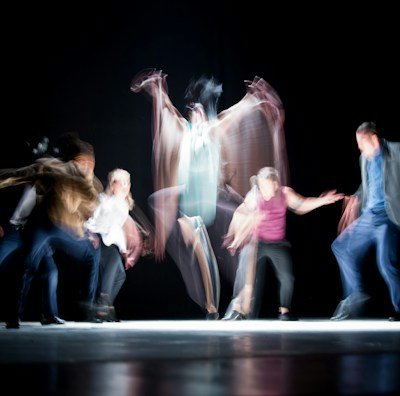 group of people dancing photo
